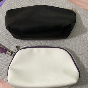 TWO - medium make up cases. One genuine leather and the other by KeraSilk.